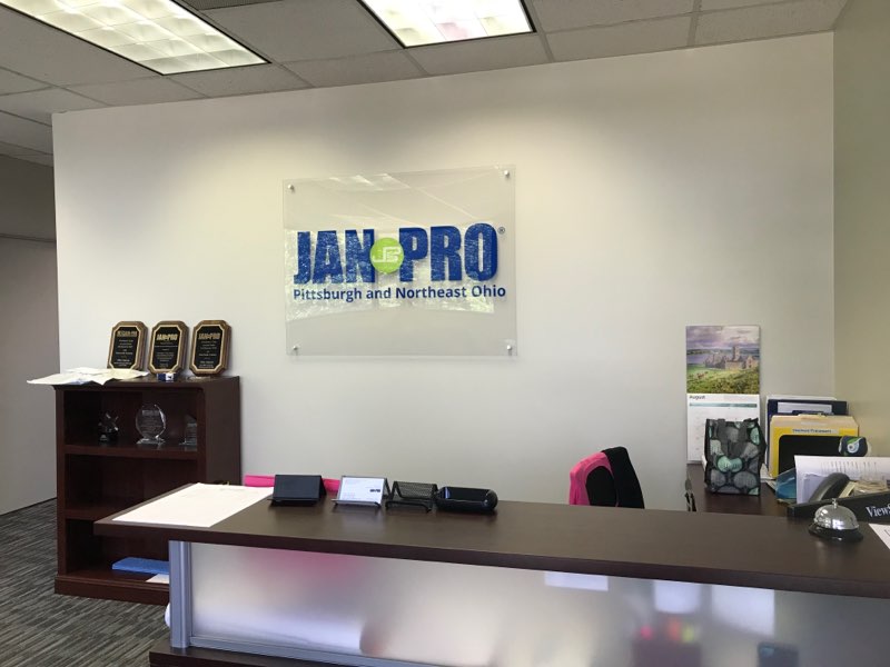 Jan Pro glass indoor wall signage