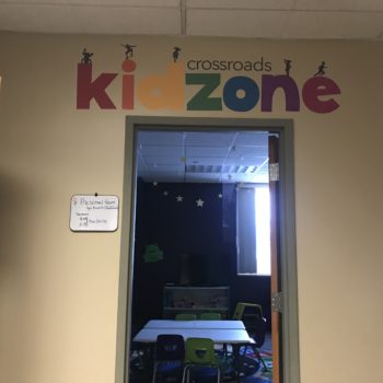 Kidzone crossroads wall lettering outside of classroom