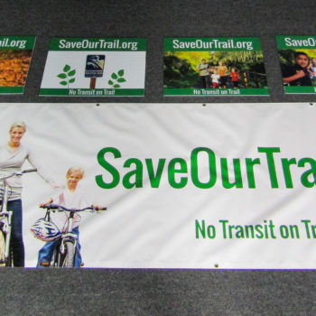 Save Our Trail posters and wall banner