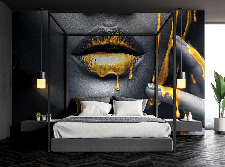 Modern bedroom with mural of woman's lips dripping gold over the headboard.