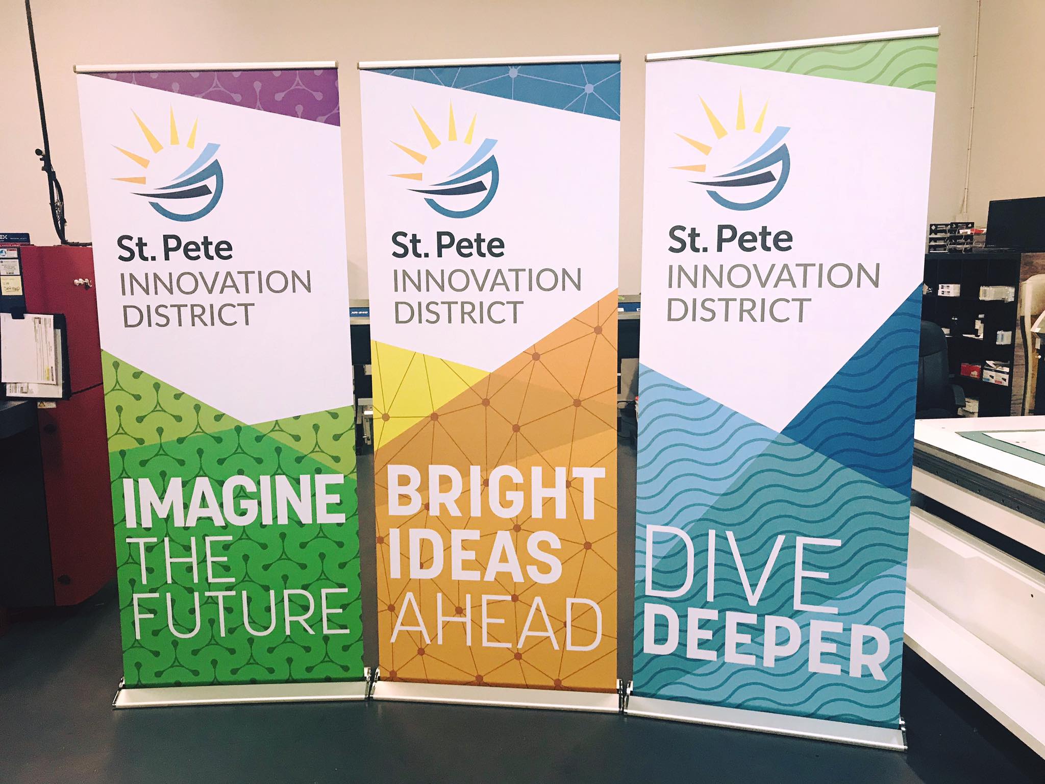 Advertising banner showcasing St. Pete Innovation District with retractable display