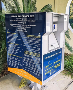 Blue and white box with yellow letters and white text, visually striking signage.