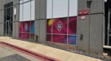 Colorful decorative window film applied to lower glass panels on a commercial building in Raleigh,NC