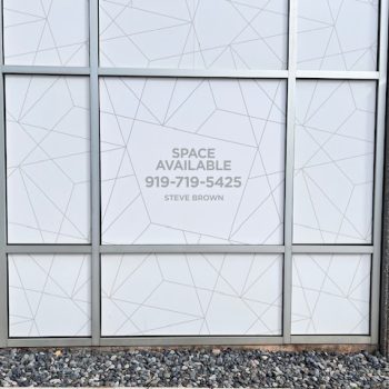 Frosted geometric window film applied on commercial glass panels in Raleigh, NC.