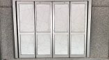 Frosted geometric pattern window film applied on four glass doors in Raleigh, NC.