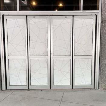 Frosted geometric pattern window film applied on four glass doors in Raleigh, NC.