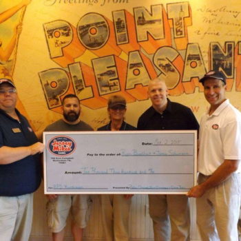 Jersey Mikes backdrop and giant check 