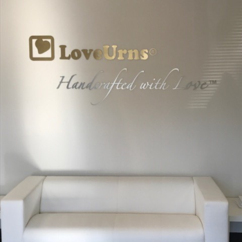 Indoor wall signage for Love Urns with text 