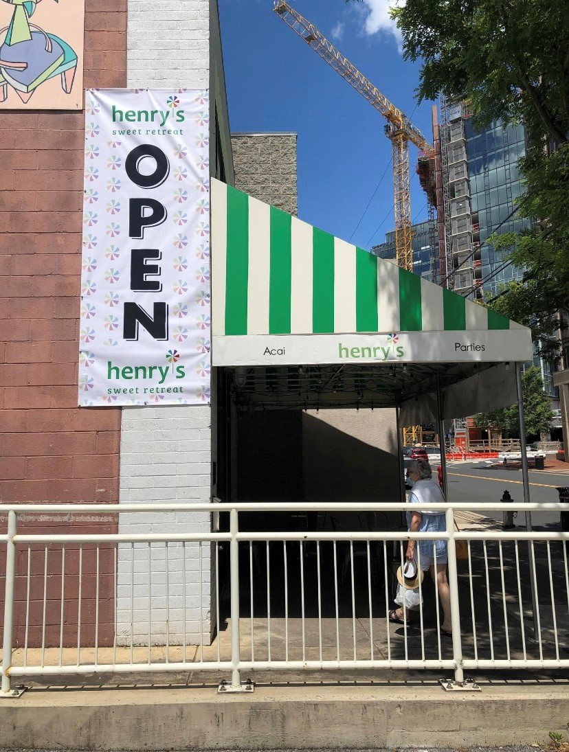Henry's Sweet Retreat outdoor banner displays 