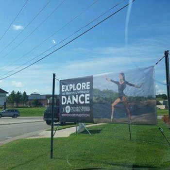large outdoor banner on the grass for dance studio