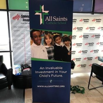 retractable banner for All saints Catholic School