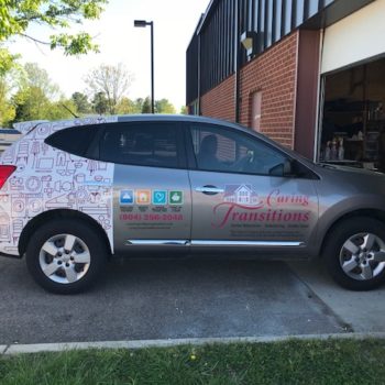 Caring Transitions company car with graphic wrap