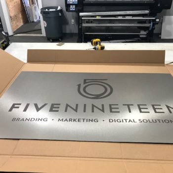 silver sign for FiveNineteen