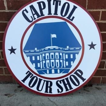 circular sign for capitol tour shop