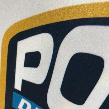 gold trim on police department sign