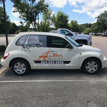 A-Box PT Cruiser with logo decals and window graphic