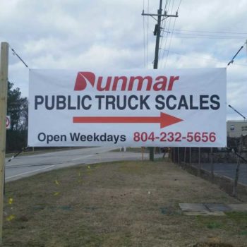 Dunmar Public Truck Sales directional roadside banner