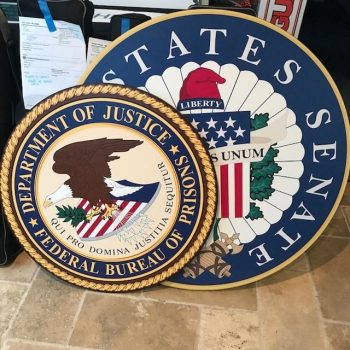 circular sign for department of justice