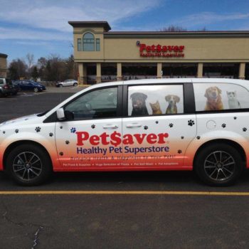 Vehicle wrap for petsaver healthy pet superstore with dogs in the windows