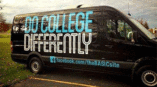 Vehicle wrap graphic for The Basic Site on black van with phrase do college differently