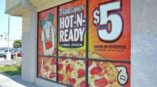 Little caesars hot n ready large pizza window graphis with 5 dollar cheese or pepperoni advertisement