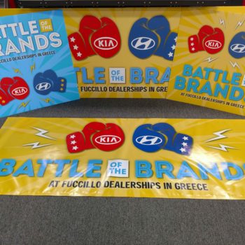 Battle of the brands banners with red and blue boxing gloves