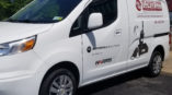 Flower City Communications van wrap with image of telephone