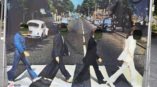 Beatles street photo event graphic with face cutouts