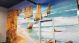Wall mural for studio featuring image of a rocky beach shore