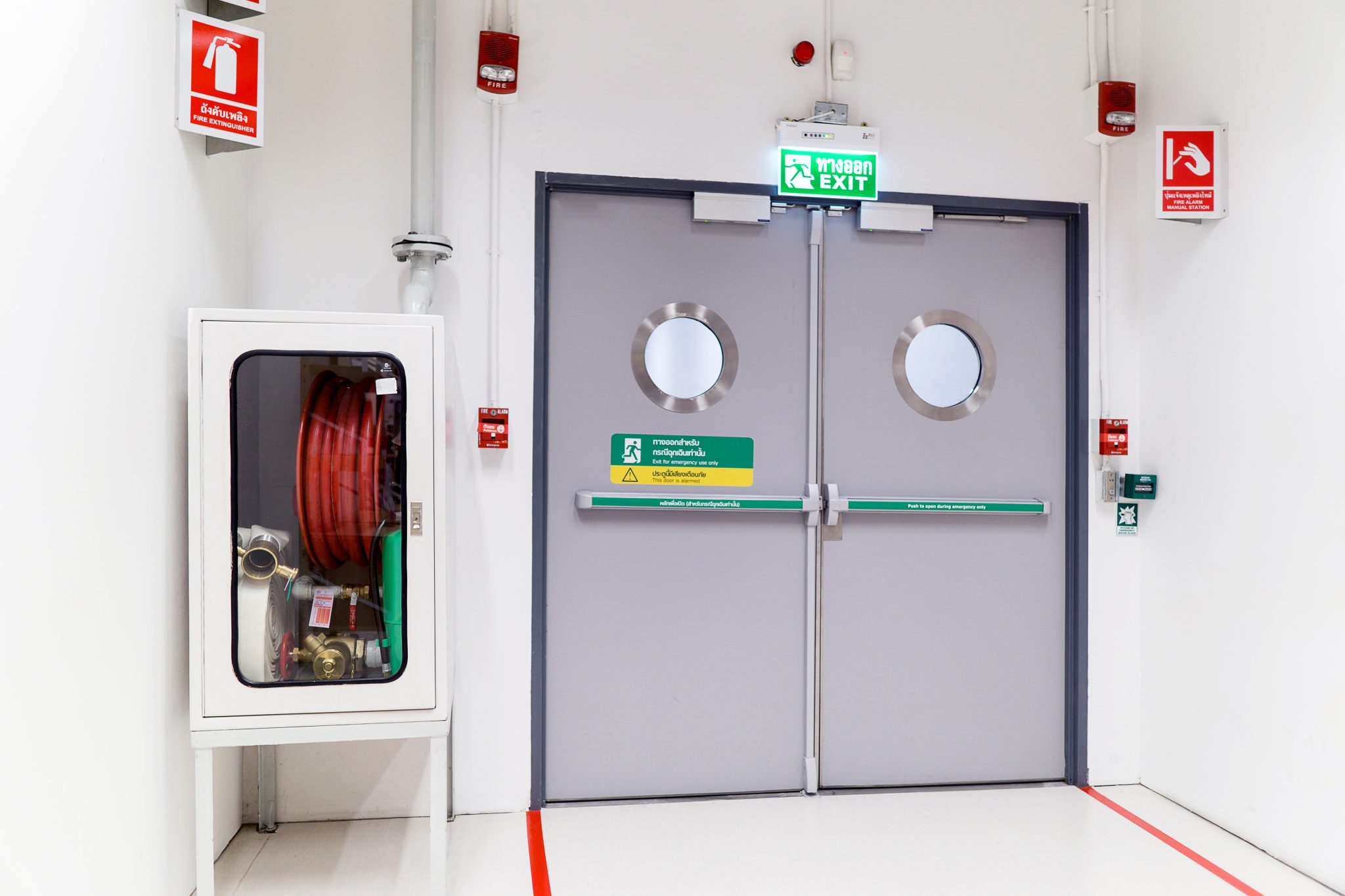 Safety signs at entry doors 