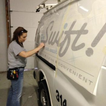 Swift Mobile Car Wash vehicle wrap being applied