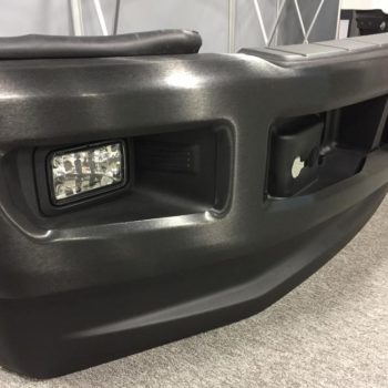 Recently applied matte black bumper wrap