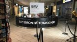 banner and table signage for simon giftcard