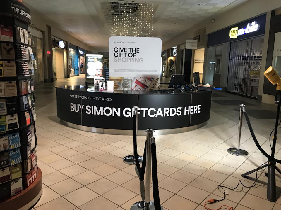 banner and table signage for simon giftcard