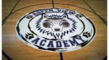 Graphic in the middle of a basketball court of Aspen View Academy