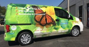 ATCO Pest Control commercial van wrap with a butterfly