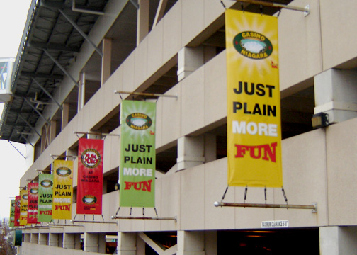 Boulevard banners hanging on parking garage that reads