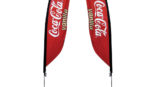 two red Coca Cola Vanilla feather banner
