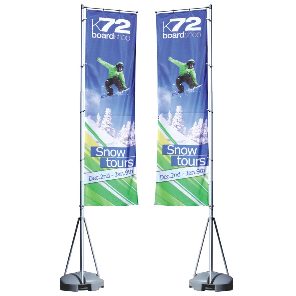 two flag signage for K72 board shop's snow tours