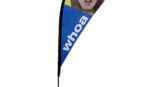 one teardrop banners on stand with an image of a womans surprised face