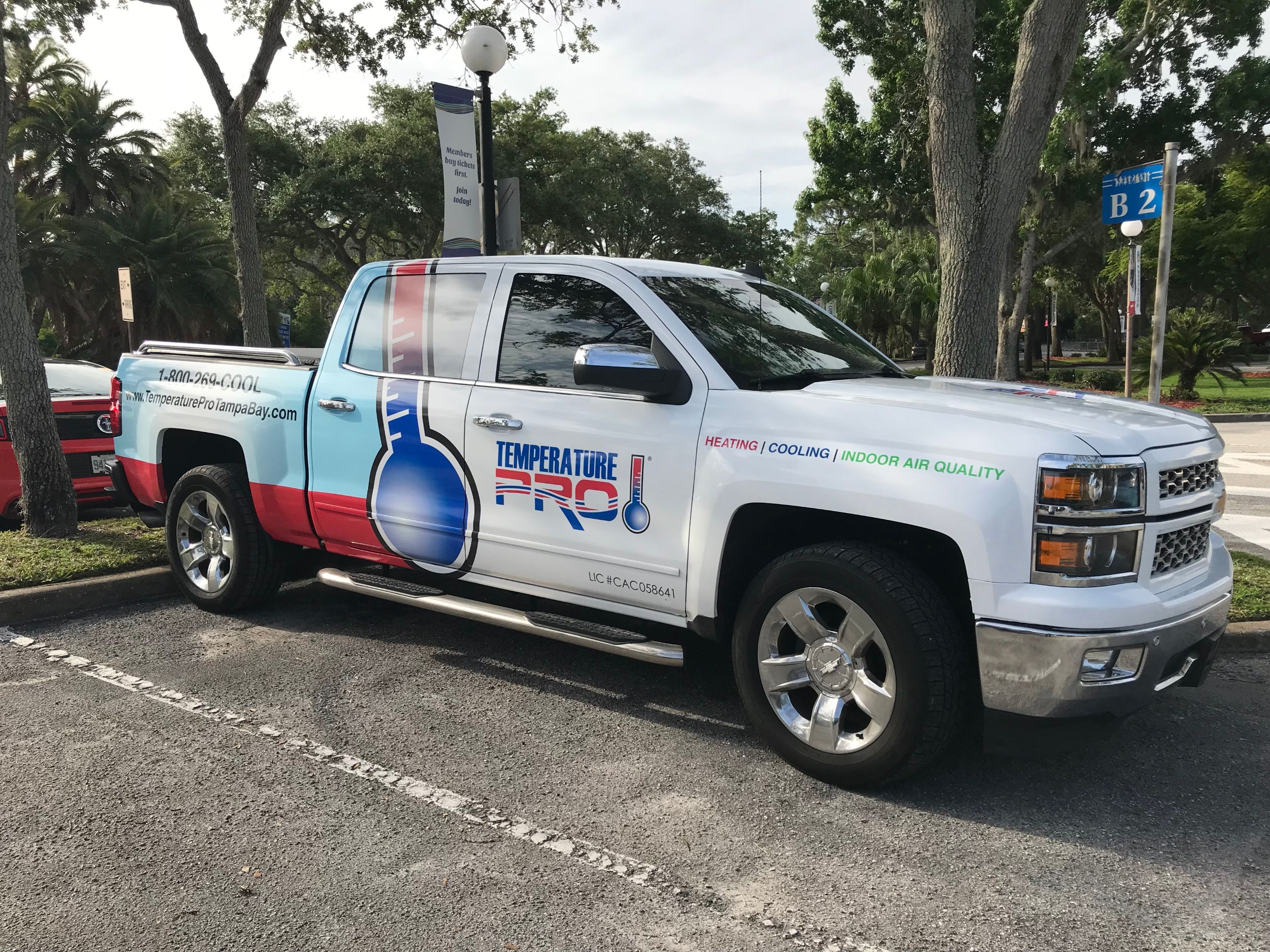 White chevy truck with vehicle wrap for Temperaturepro