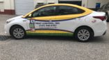 white suv with vehicle wrap for ABC Pest Control