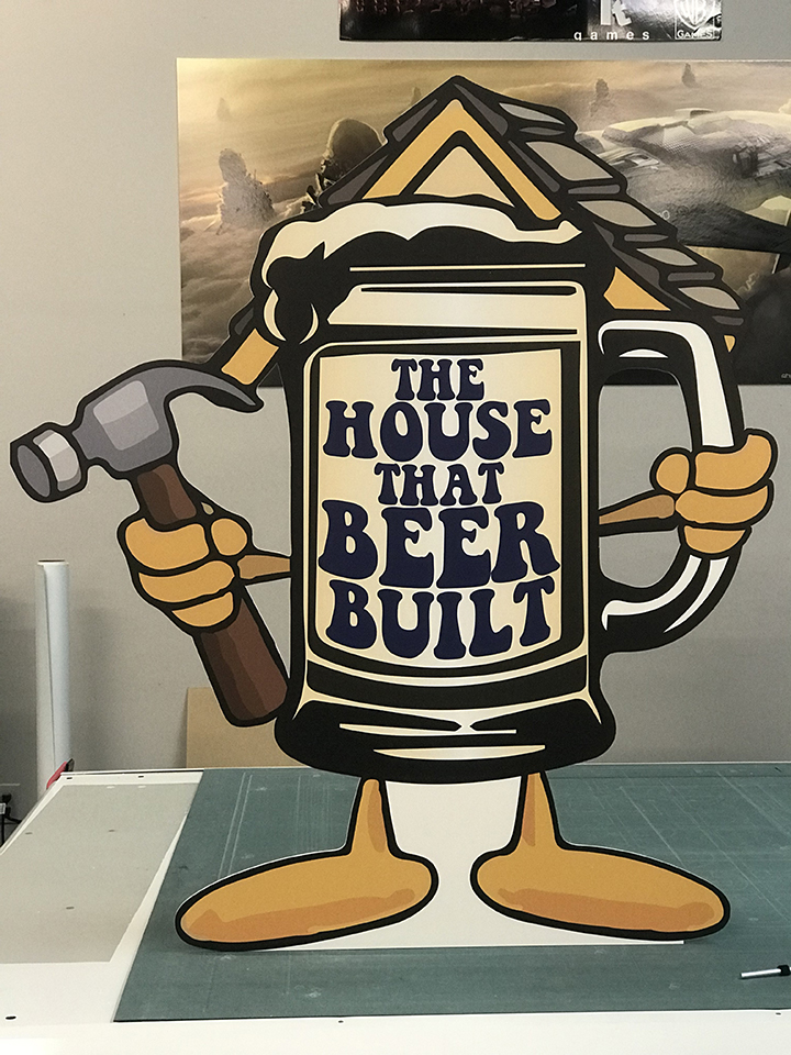 sign of a beer mug with the words 