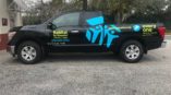 black truck with vehicle decal that reads Habitat for Humanity of Pinellas County