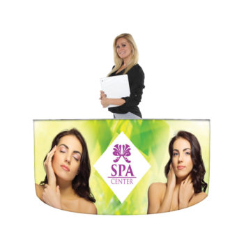 woman standing behind curved cuatro frame ez fabric counter for spa center