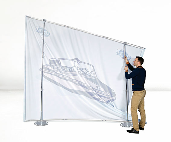man standing in back of expolinc fabric system