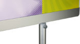 purple and yellow expolinc infor stand with button