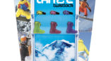 A display stand for snowboard equipment with boots and goggles on shelves.