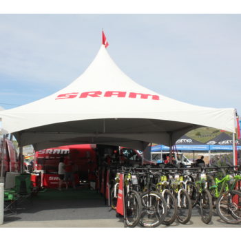 white marquee tent with bikes on bike rack