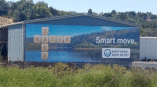 Save Water wall mural on the side of building 
